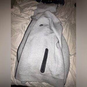 Never worn grey Nike tech